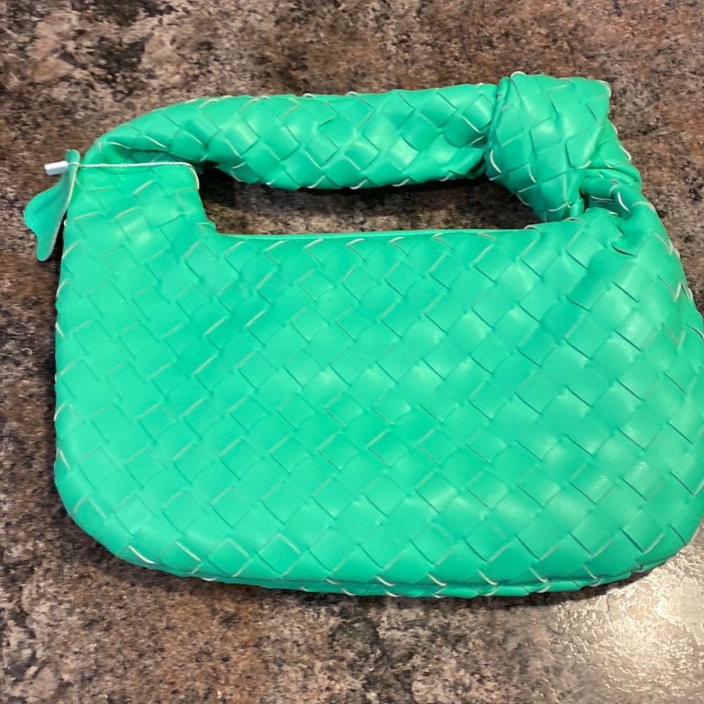 Lime green hand bag.